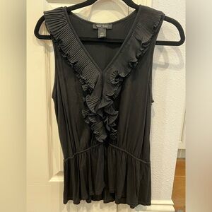 White House black market black top with ruffle and cinched waist.